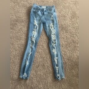 Women's Distressed Blue Jeans